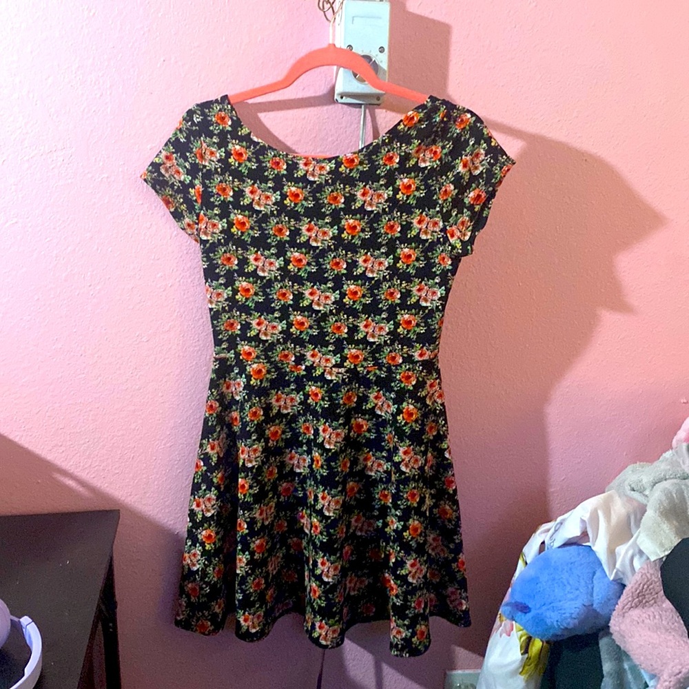 size large, black dress with red and green rose pattern, criss cross back